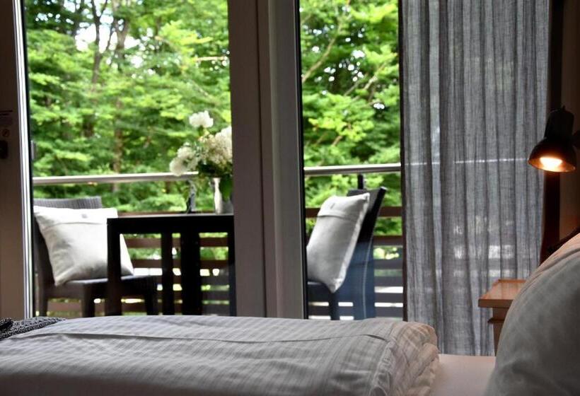 Classic room with balcony, Wellnessgarten