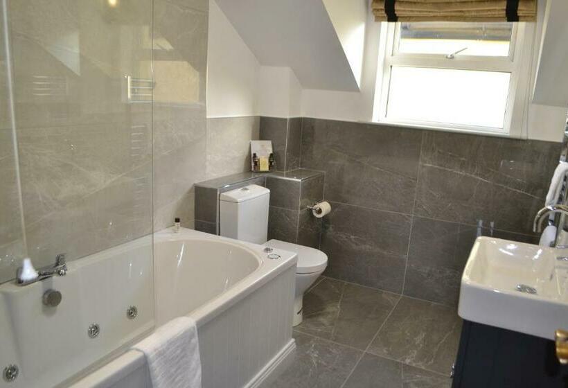 デラックススイート, Walsh S Hotel And Apartments