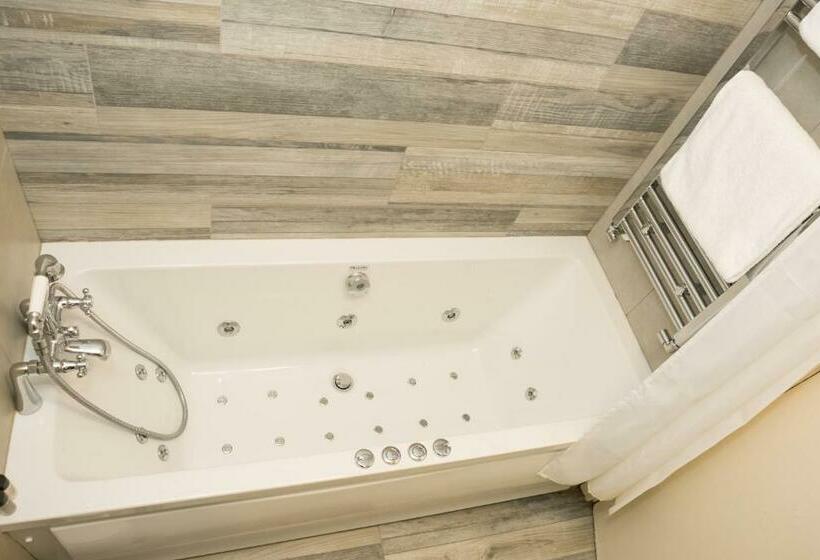 デラックススイート, Walsh S Hotel And Apartments