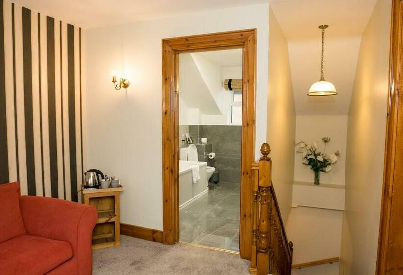 デラックススイート, Walsh S Hotel And Apartments