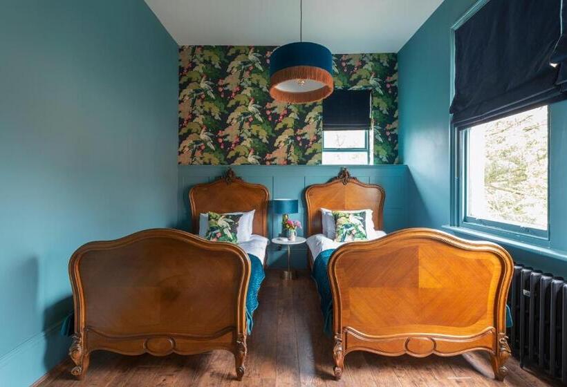 Quarto Estandar, The Coach House