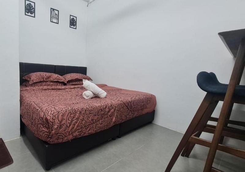 غرفة ديلوكس سرير كينج, Oyo 90866 Rakyat Inn