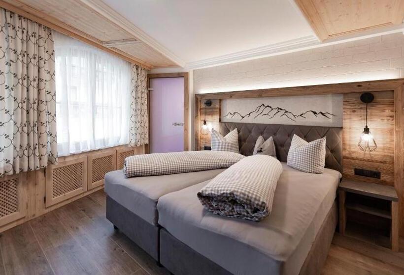 디럭스 룸, Tanzer