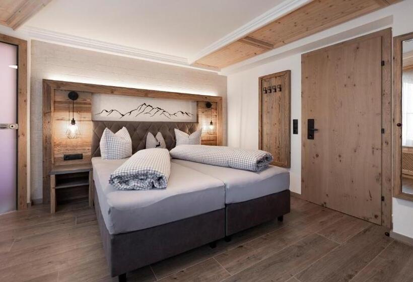 디럭스 룸, Tanzer