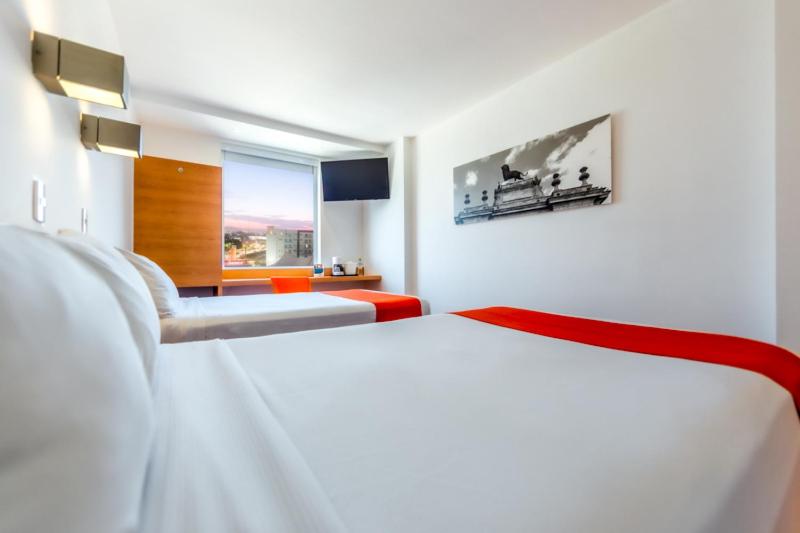 Quarto Quádruplo Estandar, Sleep Inn Leon Antares