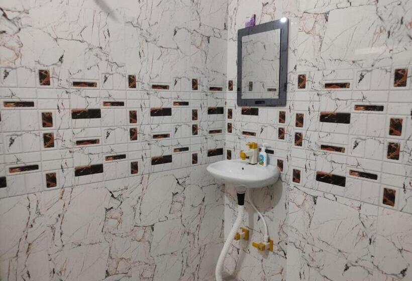 キングサイズベッドのデラックスルーム, Lord Krishna