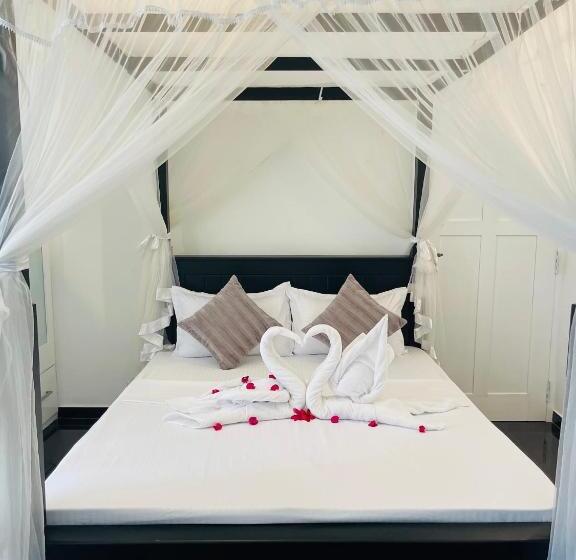 Номер Стандарт Вид на Сад, Roshe Sky Guest House Colombo
