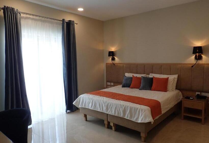 اتاق استاندارد چهارنفره با بالکن, Duncan Guesthouse