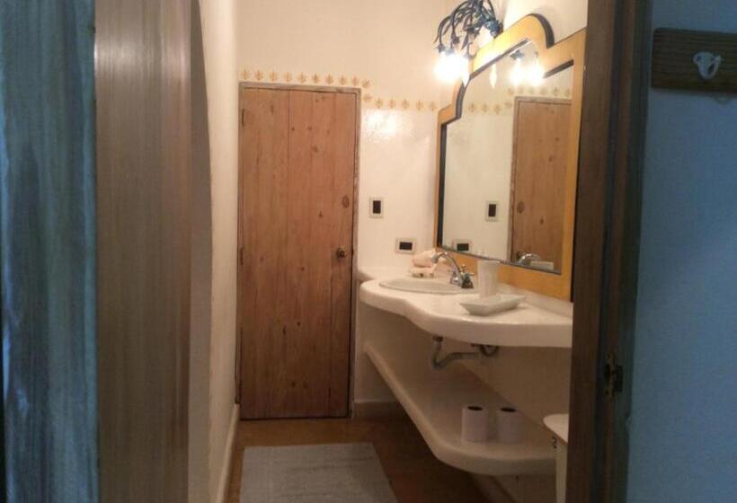 اتاق یک تخته با چشمانداز باغ, Caraibidamari