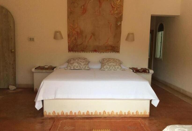 اتاق استاندارد سه تخته با چشمانداز باغ, Caraibidamari