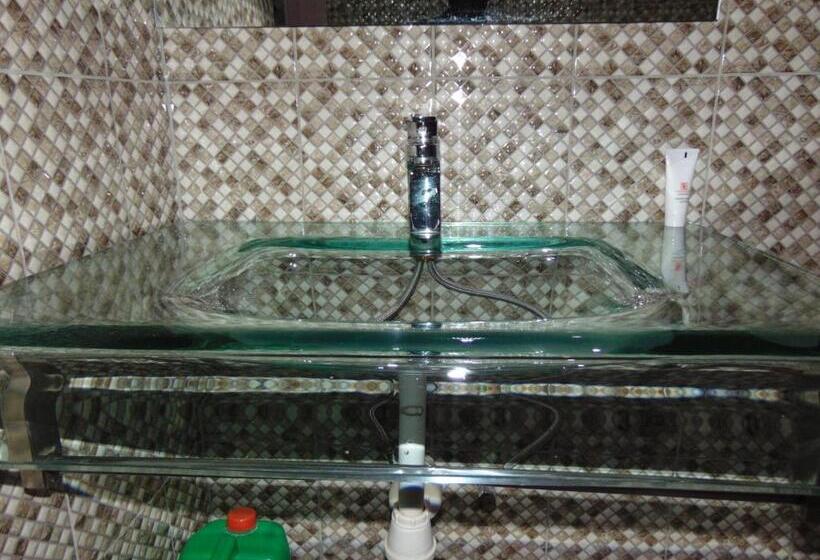 Deluxe Suite King Bed, Brisk Hotel Triangle