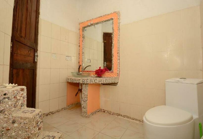 غرفة قياسية رباعية مطلة على الحديقة, Kaure Sand Beach Lodge