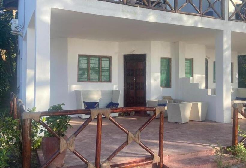 غرفة ديلوكس مطلّة علي البحر, Kaure Sand Beach Lodge