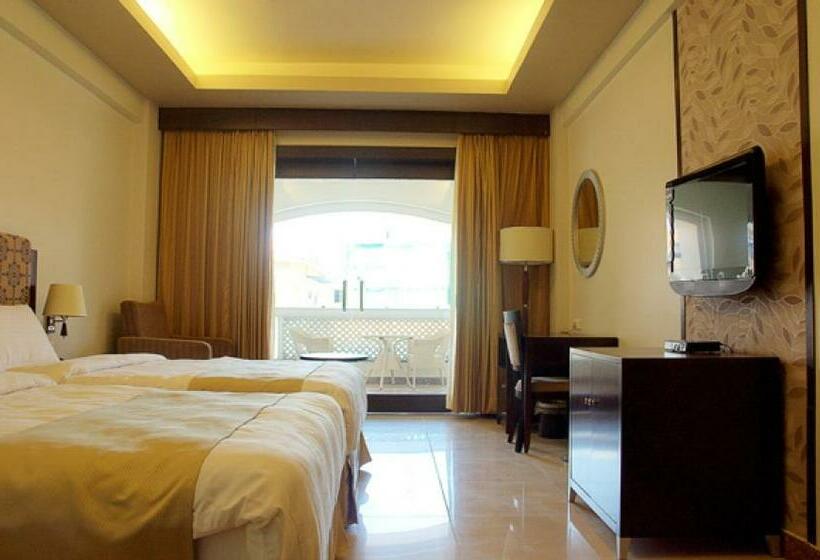 キングサイズベッドのスタンダードルーム, Pramod Convention & Club Resort