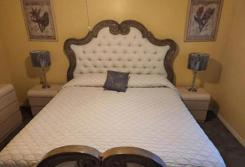 Huoneisto 1 Makuuhuone Puutarhanäkymä, Marion Lane Suites