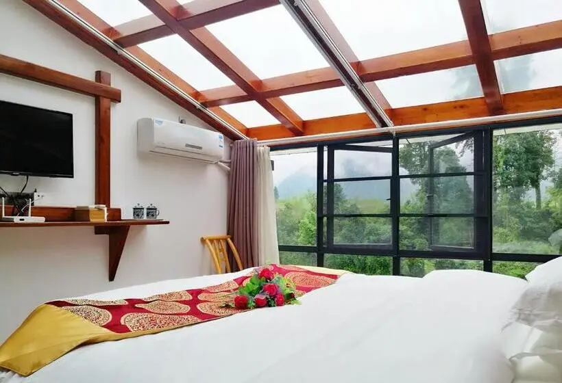 キングサイズベッドのスタンダードルーム, Zhangjiajie Jijiehao Inn