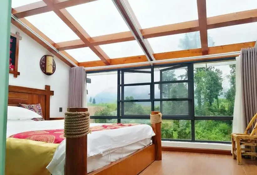 キングサイズベッドのスタンダードルーム, Zhangjiajie Jijiehao Inn