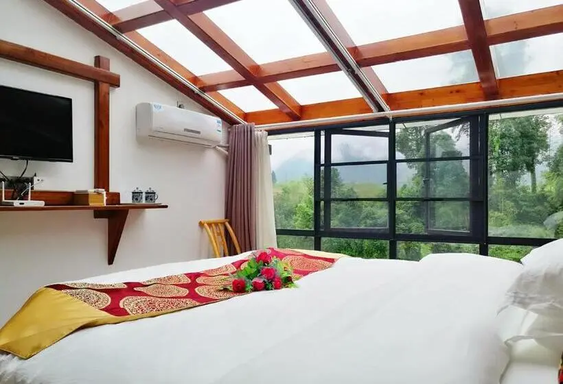 キングサイズベッドのスタンダードルーム, Zhangjiajie Jijiehao Inn