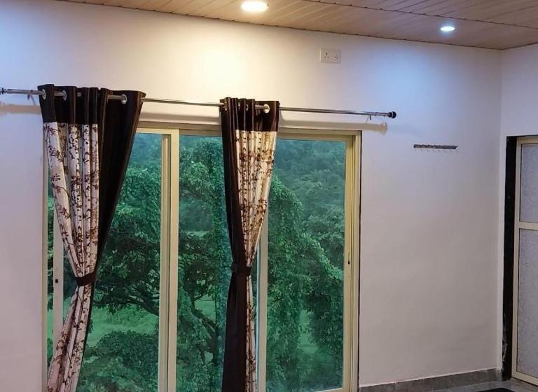 Quarto deluxe, Mountain View Farm & Camping Pali