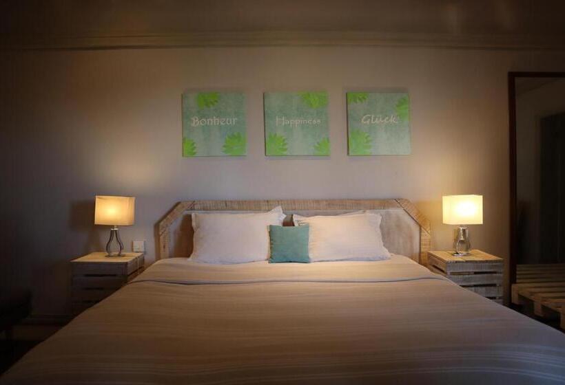 디럭스 룸 킹사이즈 침대, Le Gite Du Bonheur Guest House & Car Rental