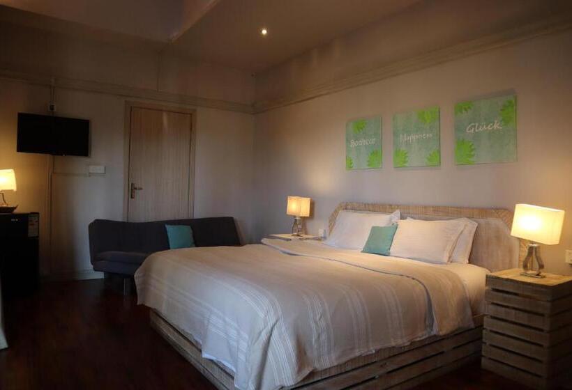 디럭스 룸 킹사이즈 침대, Le Gite Du Bonheur Guest House & Car Rental