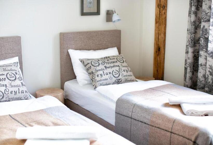 غرفة قياسية ثلاثية, Dom Młynarza