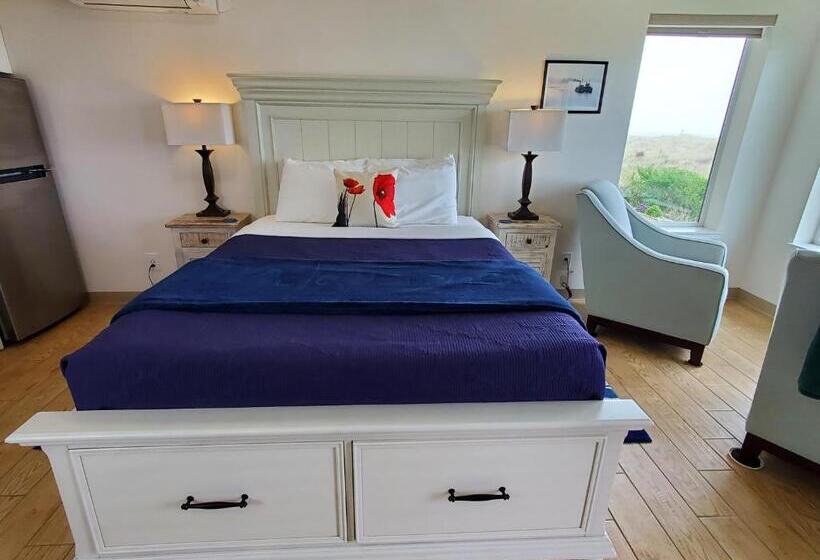 غرفة ديلوكس مطلّة علي البحر مزوَّدة بشُرفة, Moonstone Beach Motel