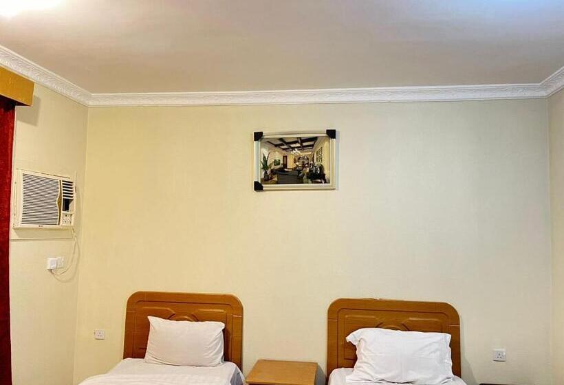 Номер Стандарт, منارة المدينة