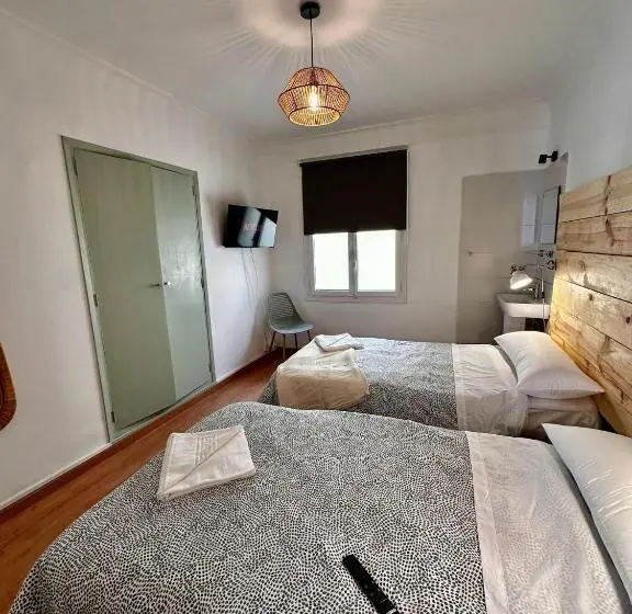 اتاق استاندارد سه تخته با سرویس بهداشتی مشترک, Hostal Atuaire Home