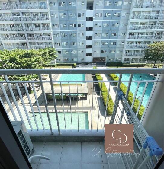 اتاق استاندارد چهارنفره با بالکن, Cd Staycation   Unit 4 At Trees Residences