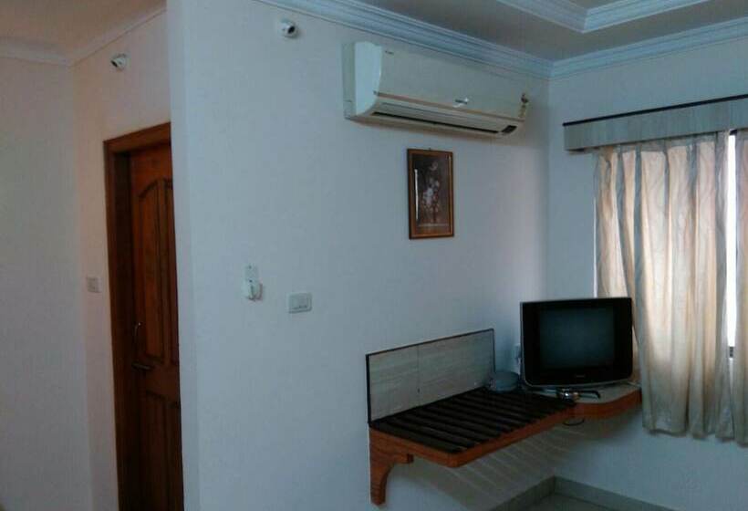 חדר דלוקס, Iroomz Amrutha Residency