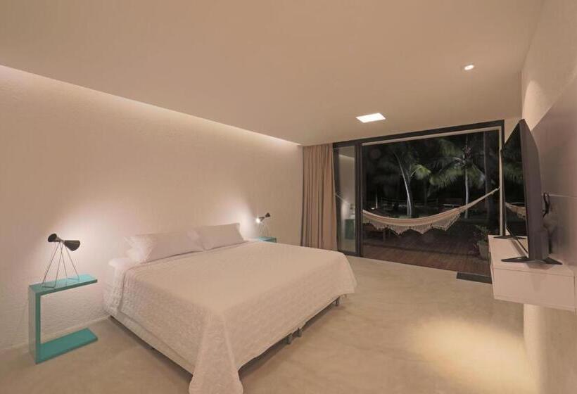 מיטת קינג בסוויטה, Pousada Ninanoa