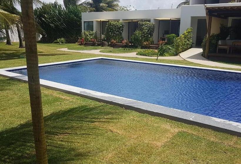 מיטת קינג בסוויטה, Pousada Ninanoa