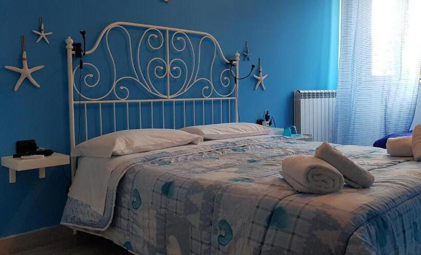 اتاق سه‌نفرۀ استاندارد با سرویس بهداشتی بیرون از اتاق, A Casa Tua B&b