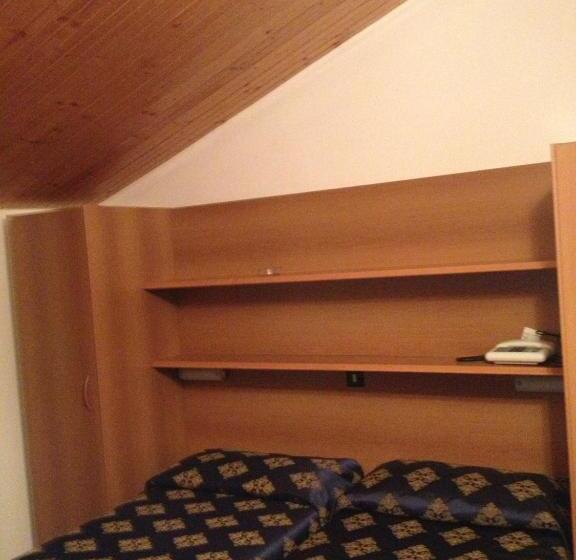 غرفة دور أخير, Merloni