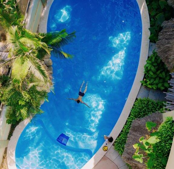 מיטת קינג בסוויטה, Casa Real Sayulita Hotel Boutique