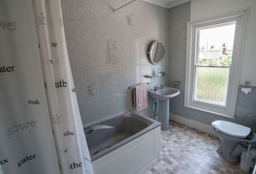 스탠다드 싱글 룸 공동욕실, Holcombe Guest House