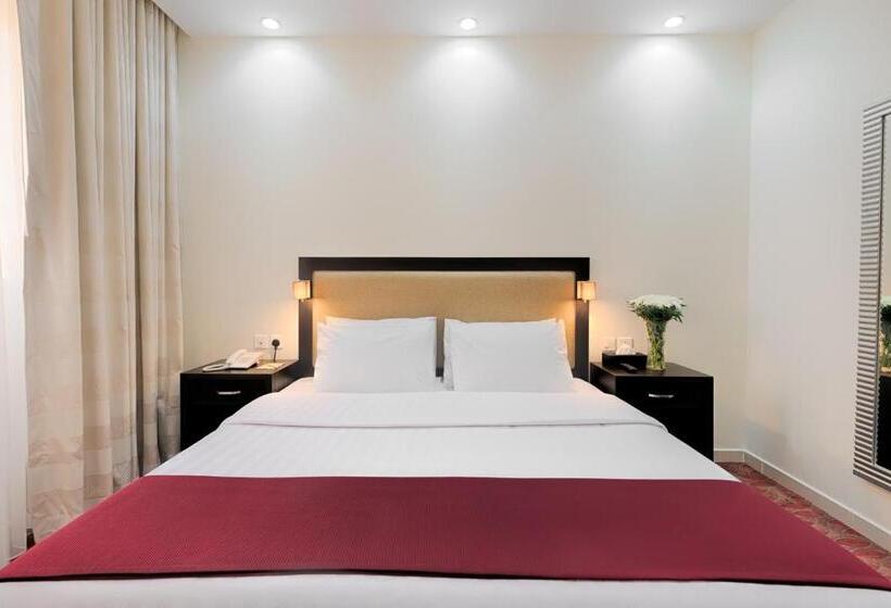 キングサイズベッドのデラックスルーム, Al Joud Boutique Hotel, Makkah