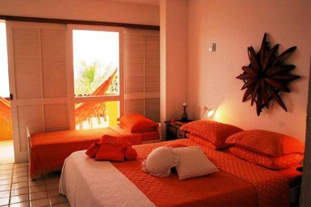 Triple Room Sea View, Pousada Casa Do Bicho Preguiça