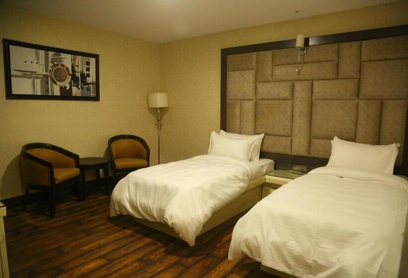 经济房, Harmony Inn