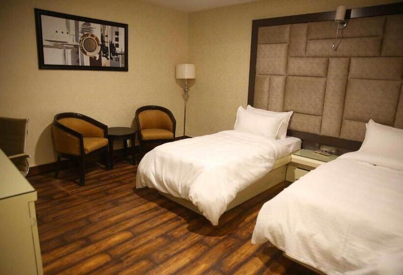 经济房, Harmony Inn