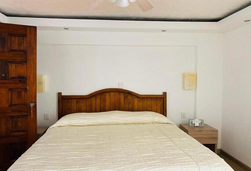 غرفة قياسية, La Mansión