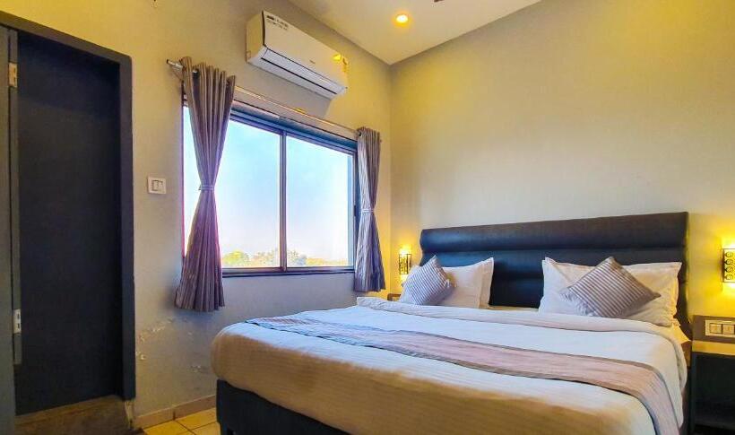 Quarto Deluxe, Nova Hotel New Crossroad