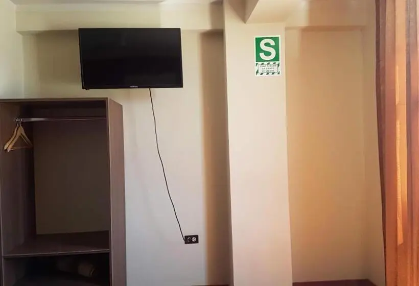 バス共有のスタンダードルーム, Cálido Hostal