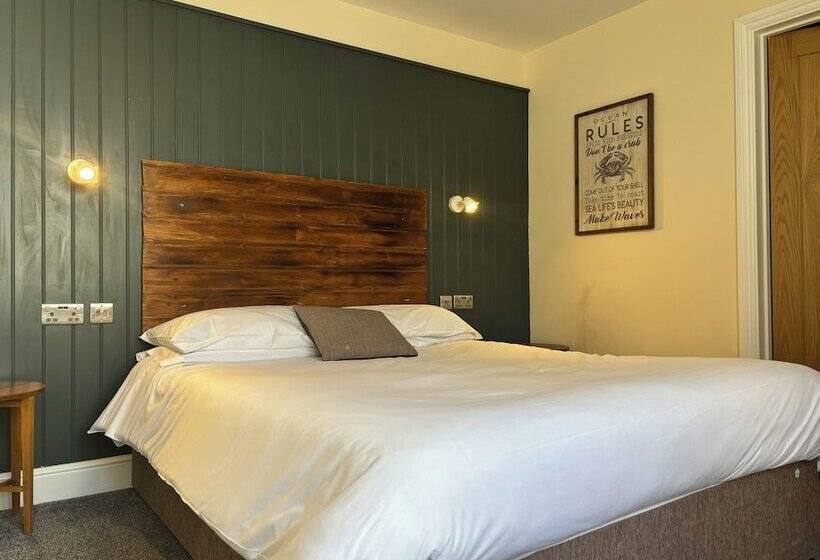 חדר דלוקס, The Golden Lion