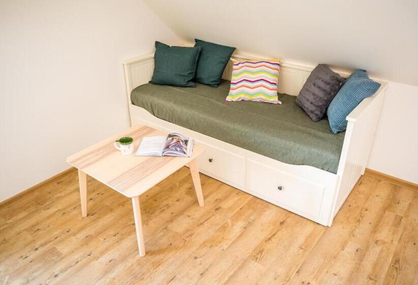 غرفة عائلية, U čmeláků