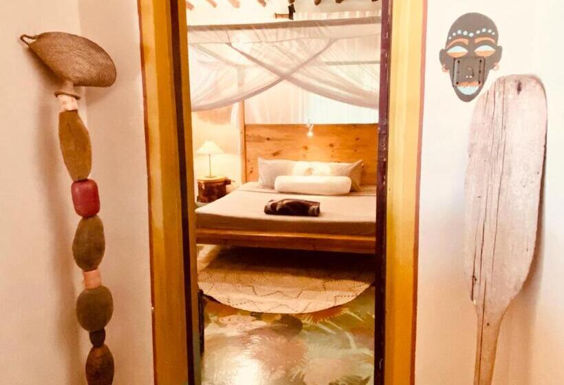 Quarto Deluxe Cama King, Mama Root