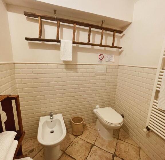 キングサイズベッドのスタンダードルーム, Novecento Room And Breakfast Puglia