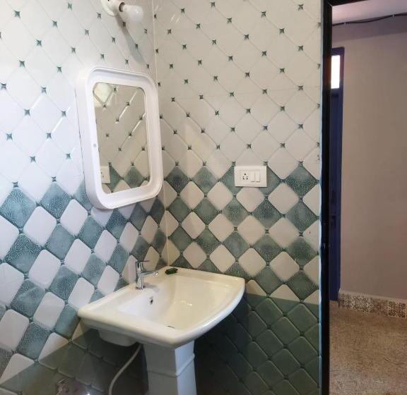 חדר דלוקס עם מרפסת נוף לים, Bens Inn