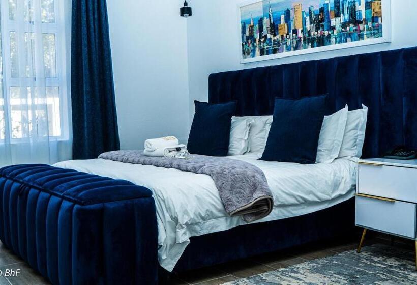 デラックススタジオ, Henry George Guest House